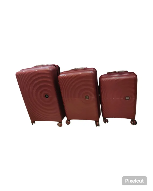Red colour trolley bag